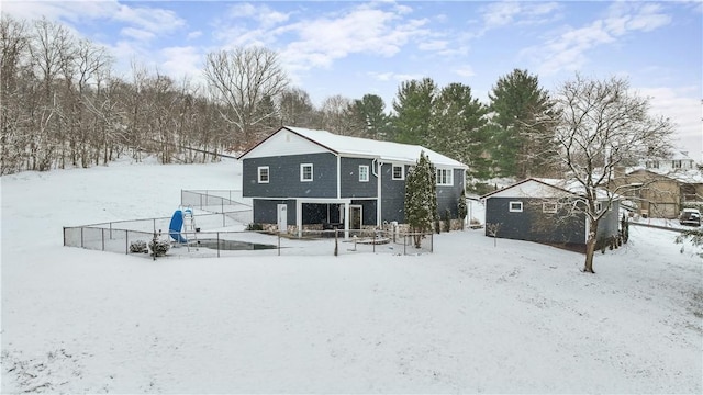 view of snow covered house