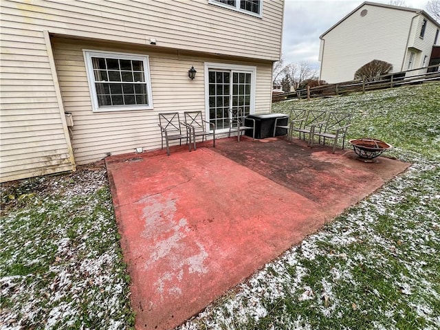 view of patio / terrace with a fire pit