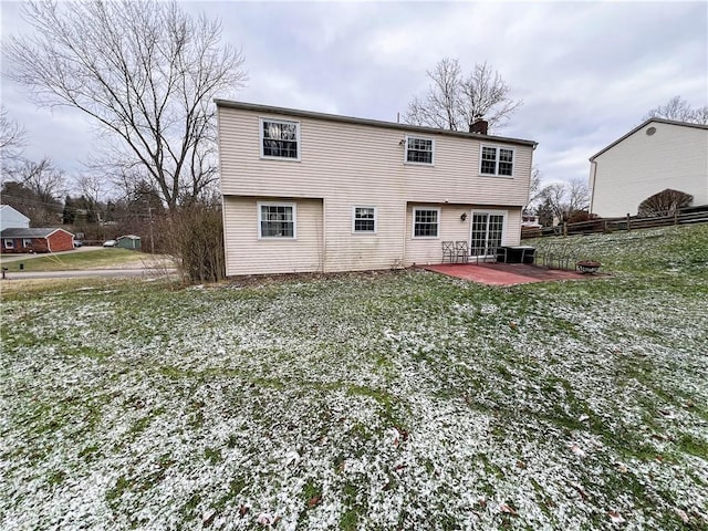 back of property with a patio area