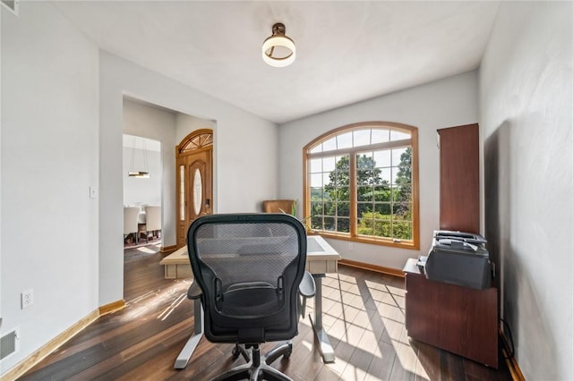 office area with hardwood / wood-style floors