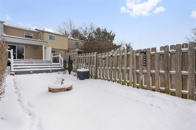 view of yard covered in snow