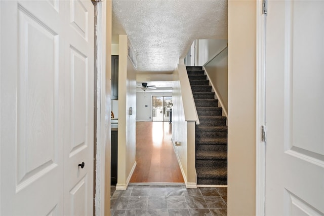 interior space with a textured ceiling