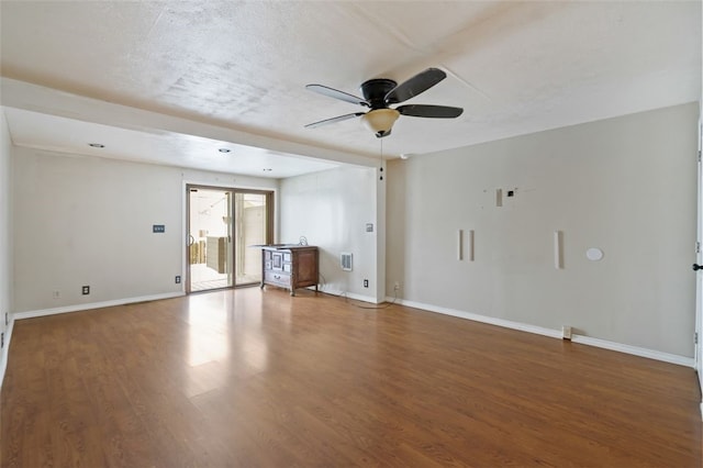 unfurnished living room featuring a textured ceiling, hardwood / wood-style flooring, and ceiling fan