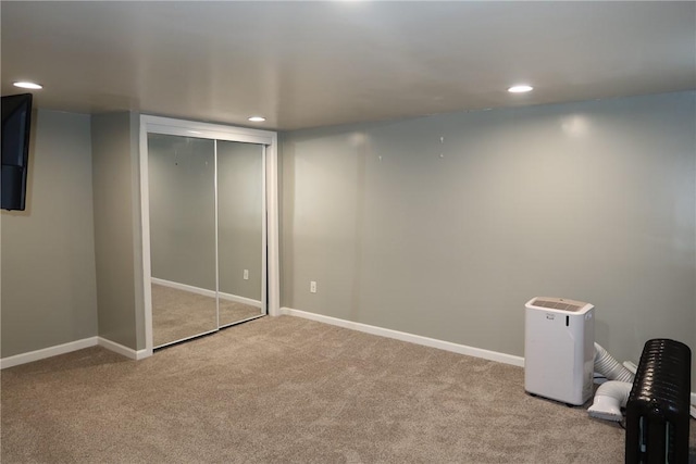 basement with light carpet