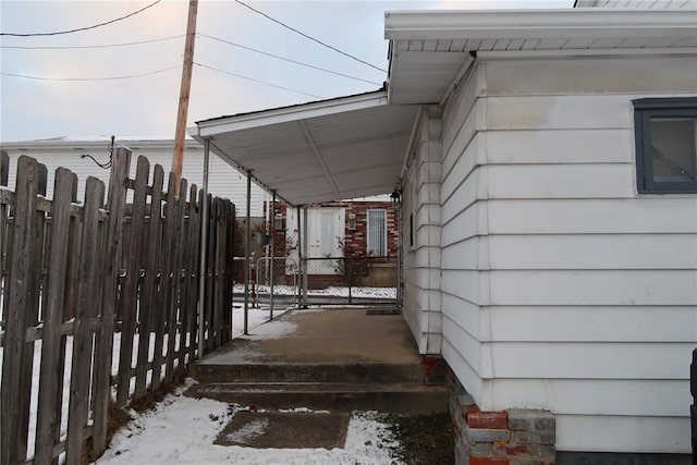 exterior space with a carport