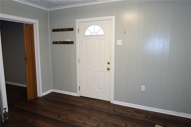 entryway featuring ornamental molding and dark wood-type flooring