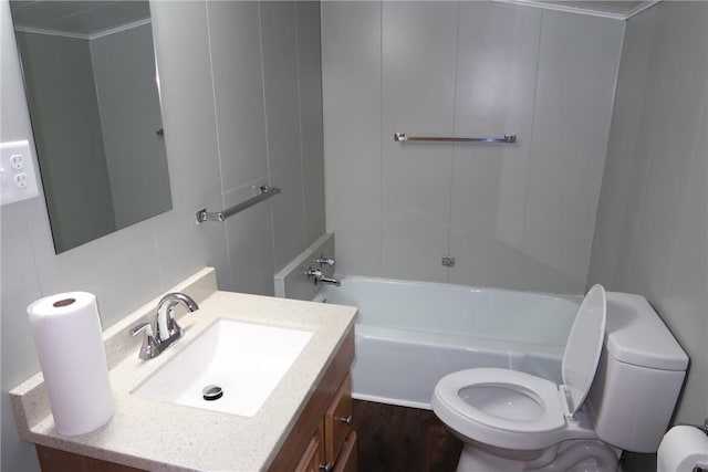 bathroom with vanity, hardwood / wood-style flooring, toilet, and crown molding