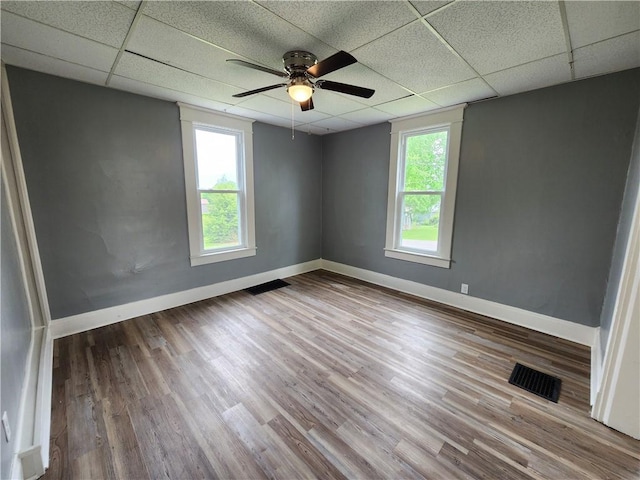2013 S Jefferson St, Shenango Twp Law, PA 16102 - unfurnished room with a ceiling fan, a paneled ceiling, baseboards, and wood finished floors