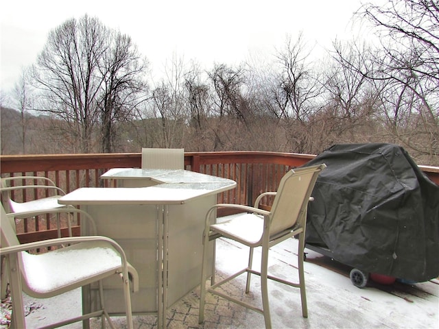 wooden terrace featuring area for grilling