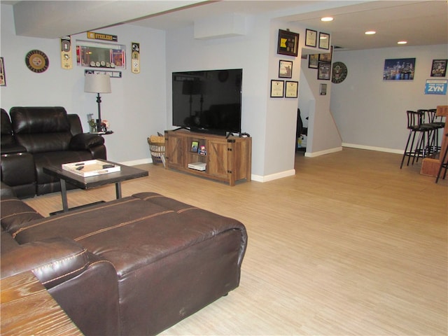 living room with hardwood / wood-style flooring