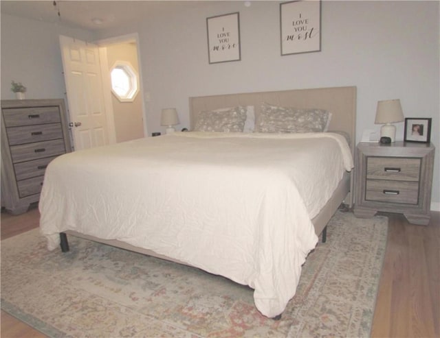 bedroom featuring light hardwood / wood-style floors