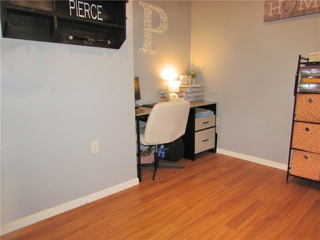 office area with hardwood / wood-style flooring