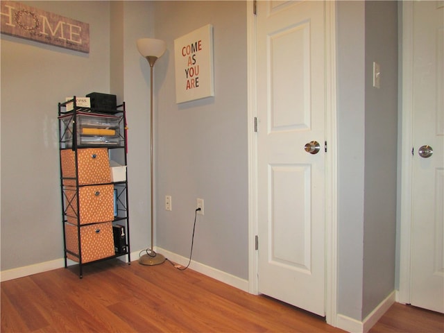 unfurnished bedroom with wood-type flooring