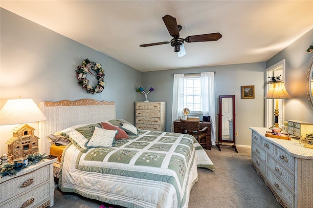 bedroom featuring ceiling fan and light carpet