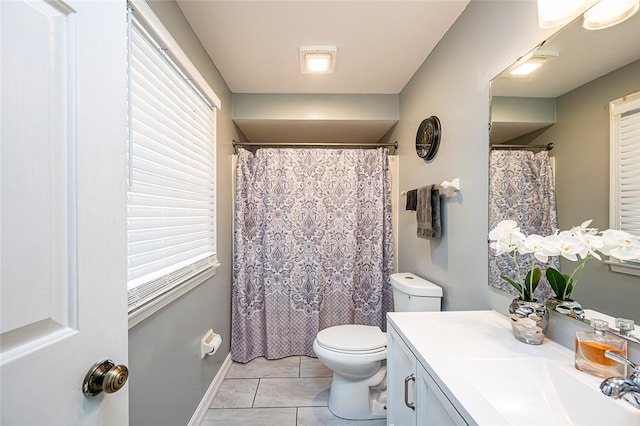 bathroom with tile patterned flooring, vanity, a shower with shower curtain, and toilet