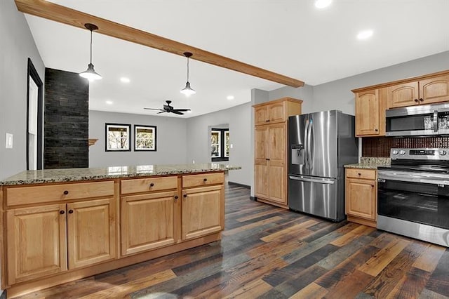 kitchen with light stone countertops, ceiling fan, stainless steel appliances, tasteful backsplash, and pendant lighting