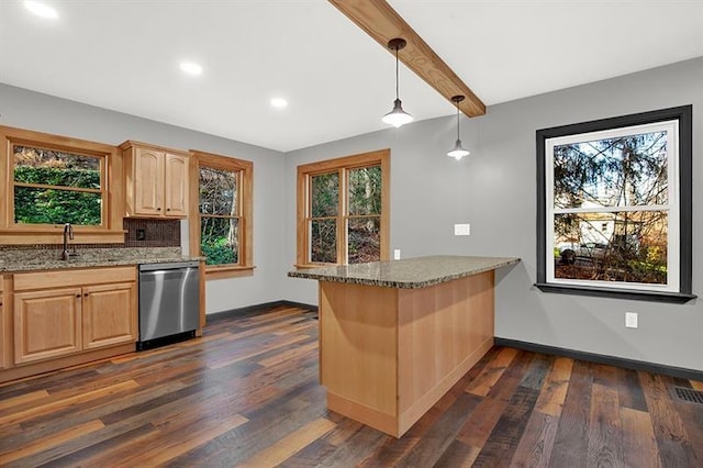 kitchen featuring stainless steel dishwasher, beam ceiling, light stone counters, and hanging light fixtures