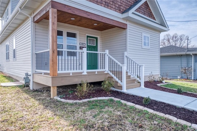 doorway to property with a porch