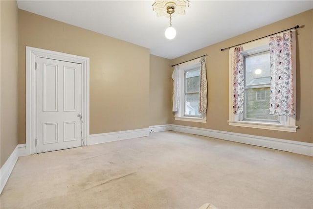 spare room featuring carpet flooring