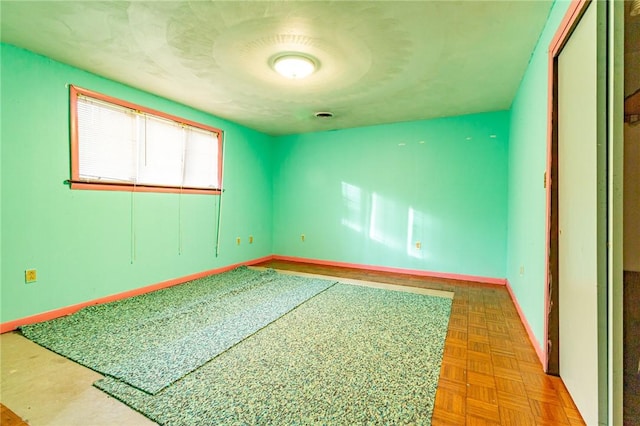 empty room with parquet floors