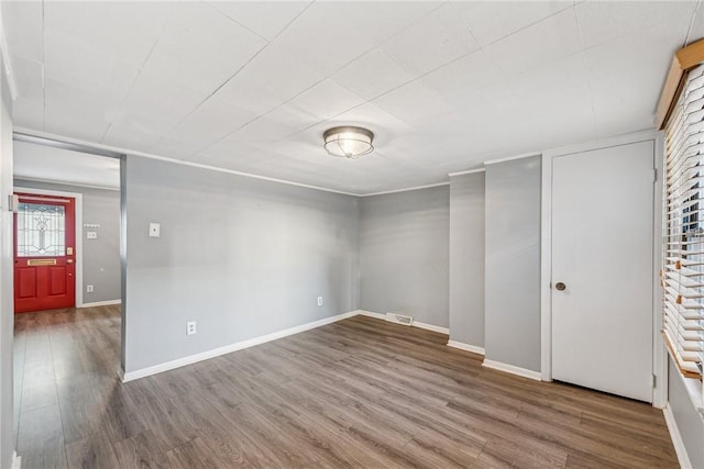 empty room featuring hardwood / wood-style floors