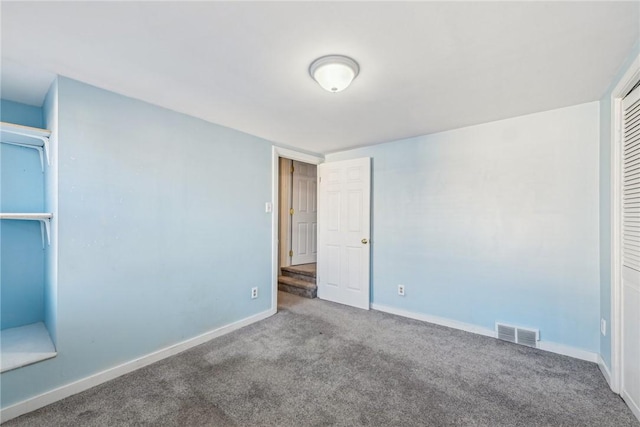 interior space with carpet and a closet