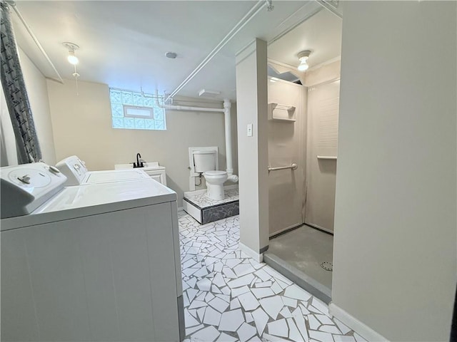 washroom with separate washer and dryer