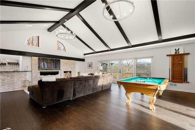 playroom with beam ceiling, dark hardwood / wood-style flooring, high vaulted ceiling, billiards, and a fireplace