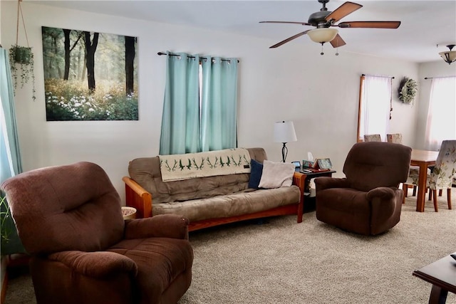 living room with carpet and ceiling fan