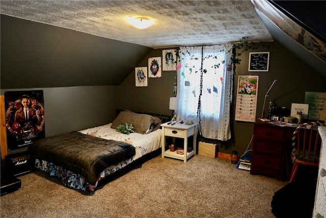 carpeted bedroom featuring a textured ceiling and vaulted ceiling