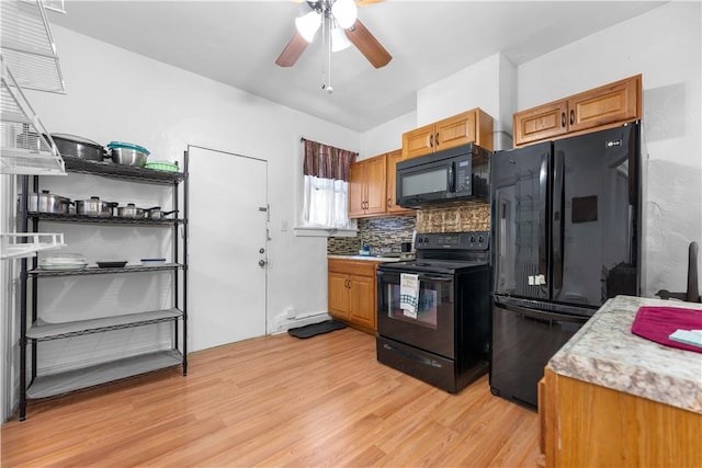 kitchen with decorative backsplash, ceiling fan, light hardwood / wood-style flooring, and black appliances