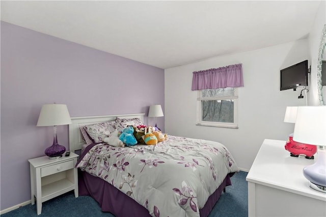 bedroom featuring dark colored carpet