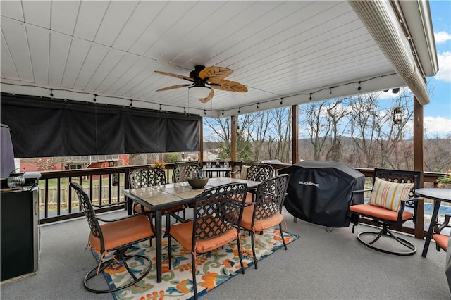 sunroom / solarium featuring ceiling fan and a healthy amount of sunlight