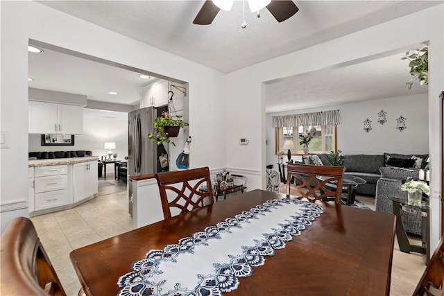 dining space with ceiling fan