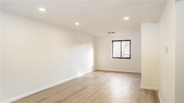 empty room featuring light hardwood / wood-style floors