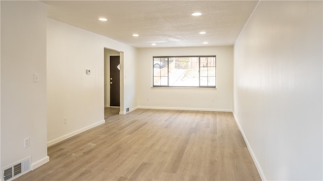 empty room featuring light hardwood / wood-style flooring