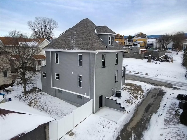 view of snow covered property