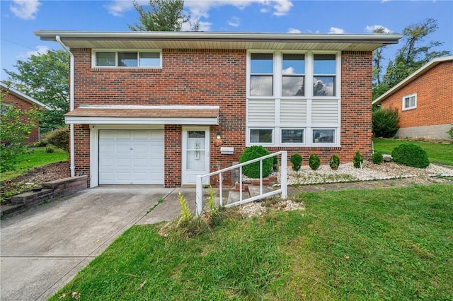 view of front of property featuring a garage and a front yard