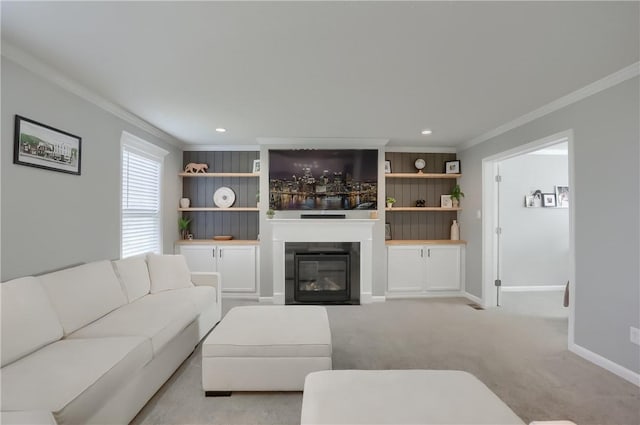 carpeted living room featuring crown molding