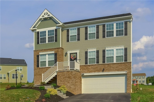 view of front of property featuring a garage