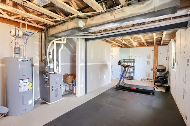 basement with heating unit and water heater