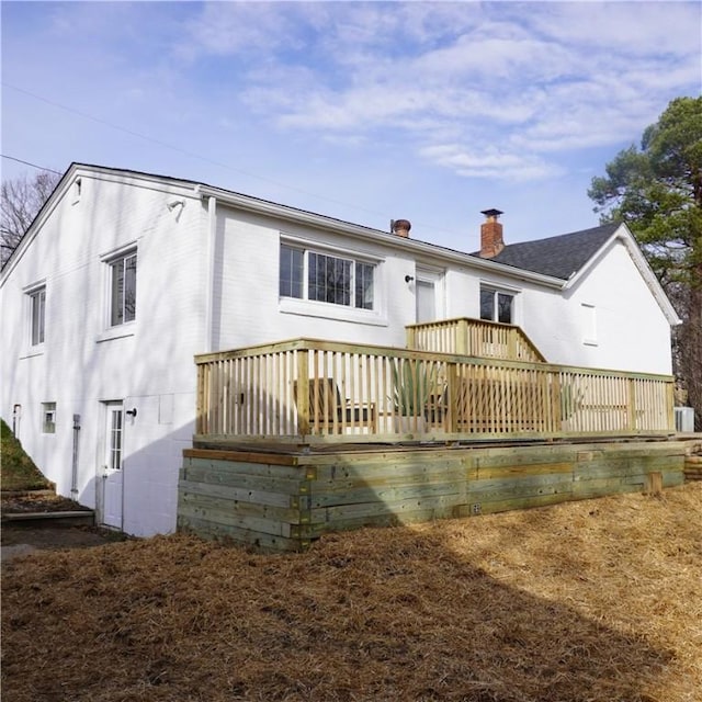 rear view of property with a deck