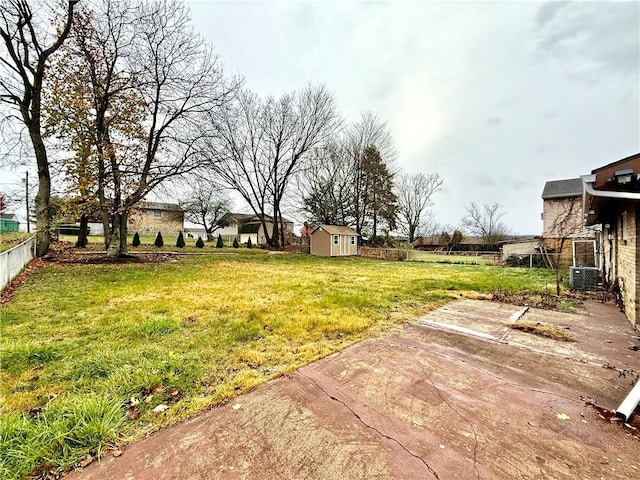 view of yard featuring a patio area and central AC unit