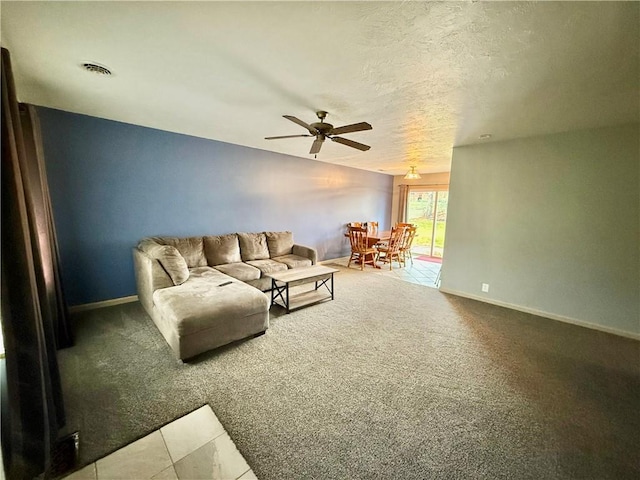 living room with carpet and ceiling fan