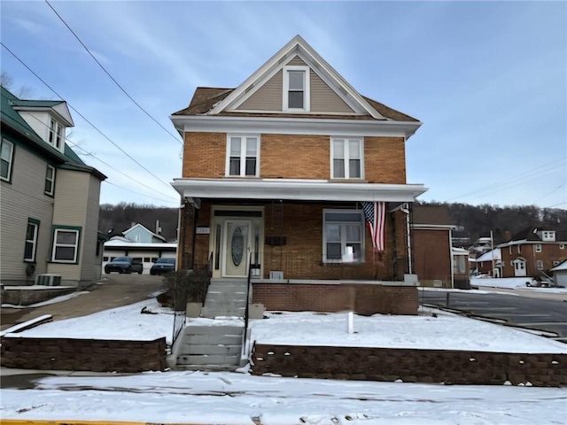 view of property with a porch