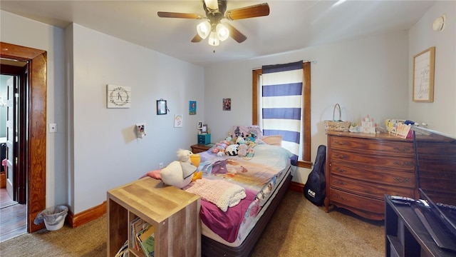 carpeted bedroom with ceiling fan