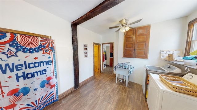 laundry area with separate washer and dryer, hardwood / wood-style flooring, and ceiling fan