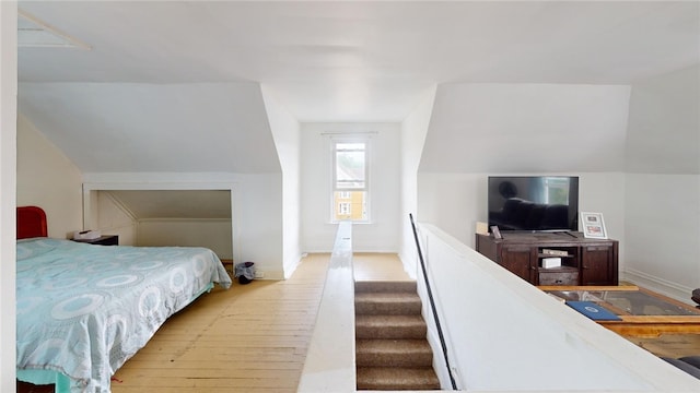 bedroom with hardwood / wood-style flooring