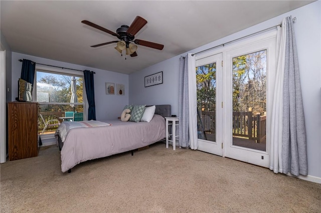 bedroom featuring access to exterior and ceiling fan