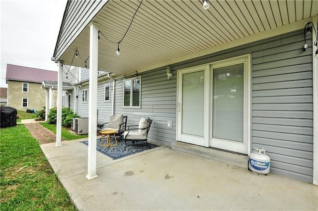 view of patio with central AC unit